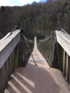 lookng down on a very sttep footbridge